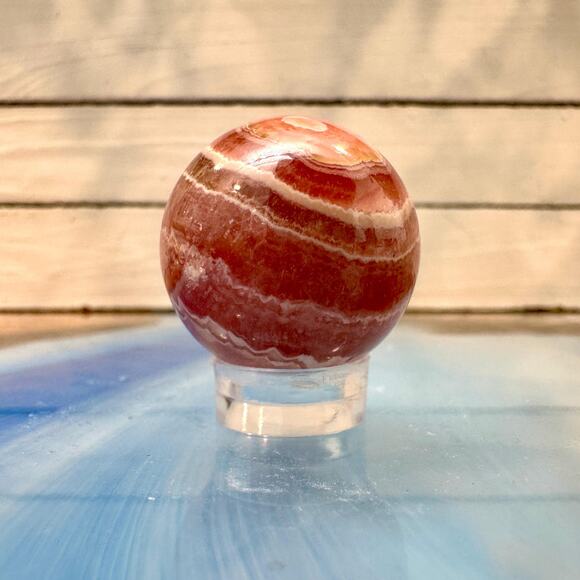 44 g Rhodochrosite Polished Sphere – 25 mm – Argentina Pink Banded Stone - Picture 1 of 3